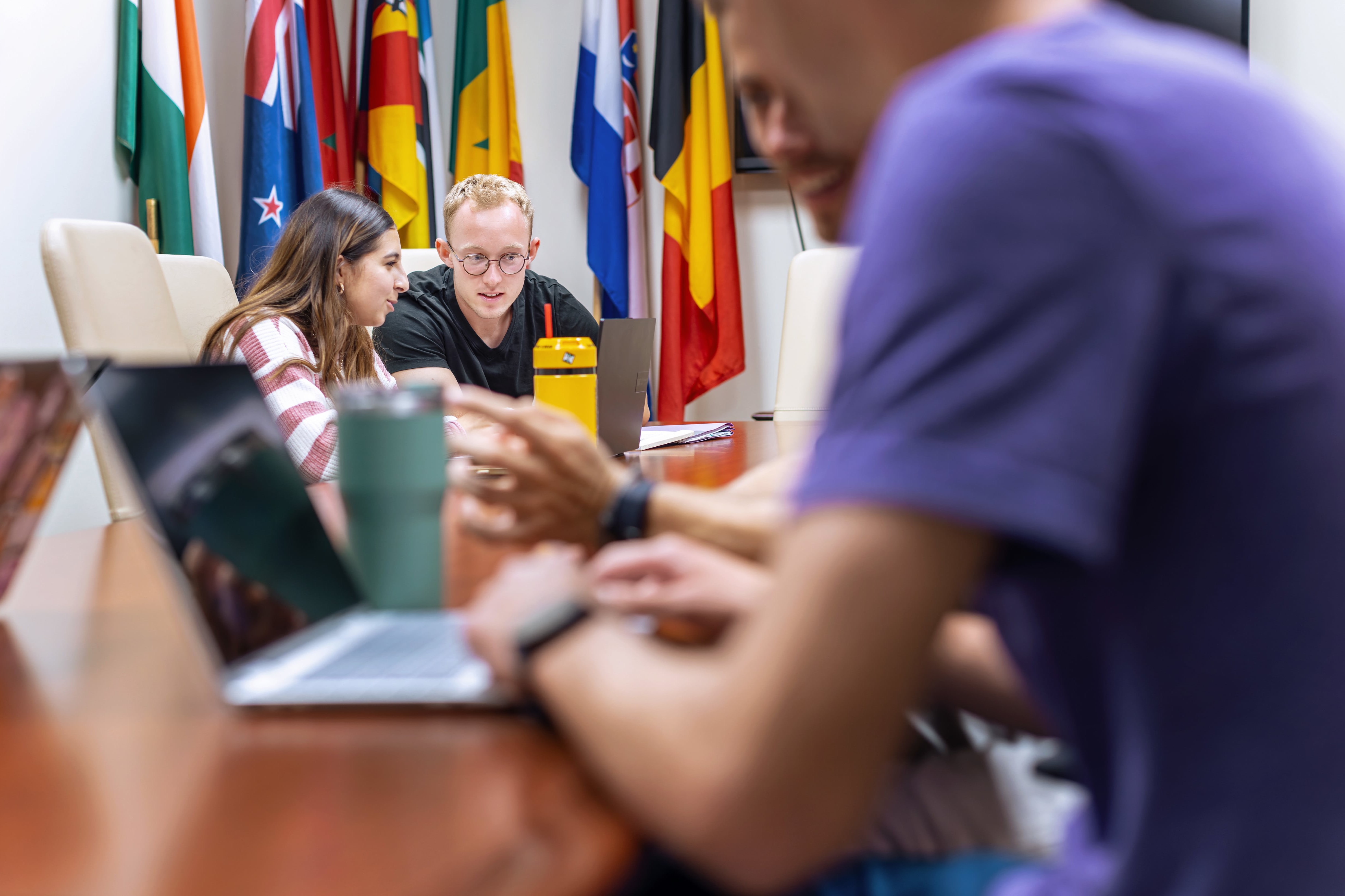 Students study together at table